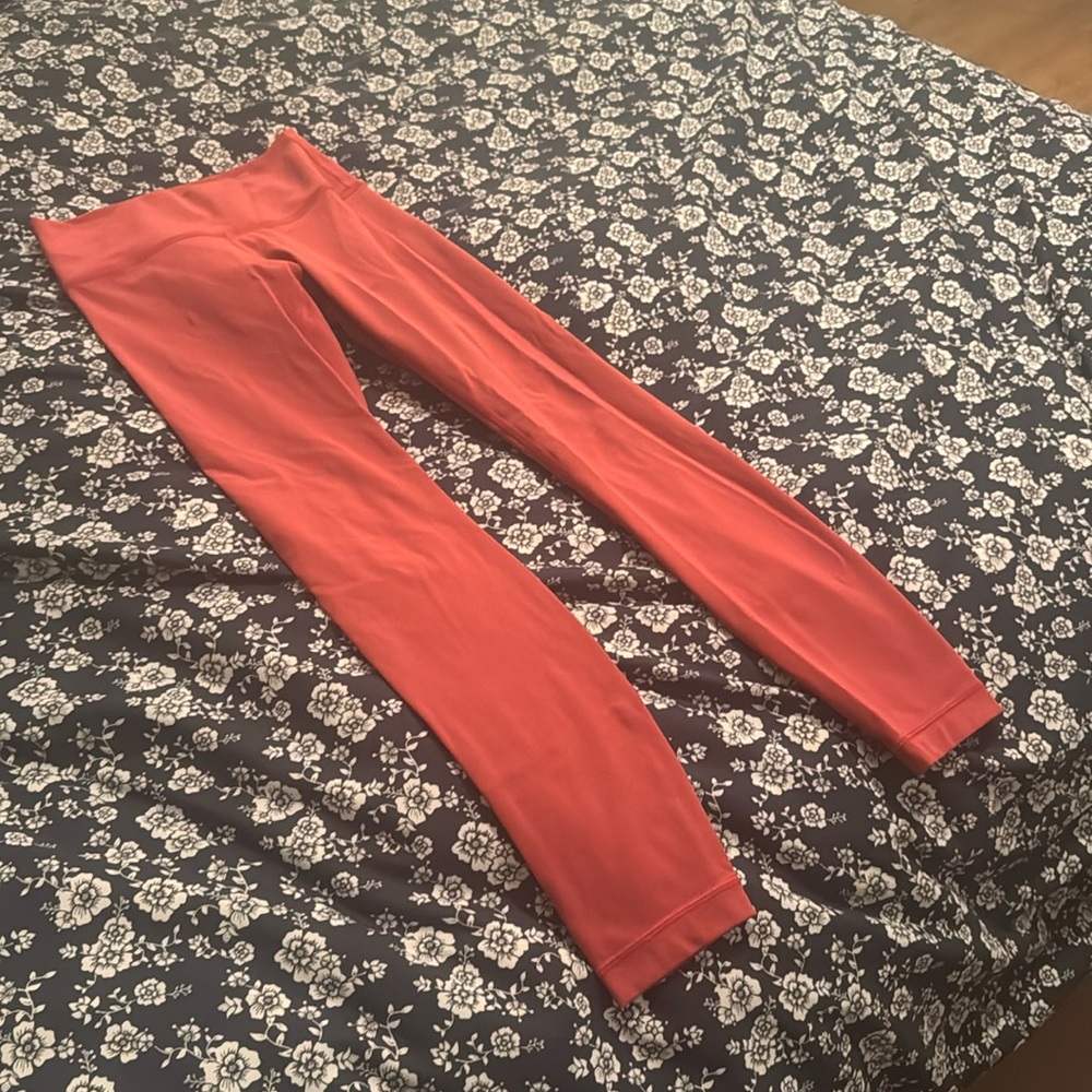 Pink lululemon size 2 leggings. No tags. No dance. Hit at ankle and I’m 5’5”